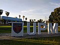 Sculpture logo UPM in front of main hall