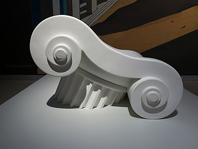 Postmodern reinterpretation of the Ionic column as the Capitello seating, designed by Studio 65 and produced by Gufram, differentiated-density polyurethane foam coated with latex rubber, 1972, unknown location[32]