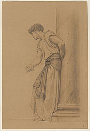 Youth leaning against pillar