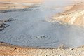 One of the substances condensing out of the steaming hot mud is Sulphur at Námaskarð