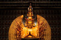 The wooden statue of thousand-armed and thousand-eyed Guanyin at the City of Ten Thousand Buddhas in Ukiah, California.