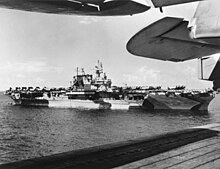 USS Enterprise (CV-6) anchored off Saipan, circa mid-1944 (NH 97266).jpg