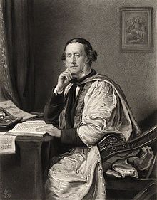 engraving of portrait of middle aged man sitting at desk, wearing doctoral robes, clean shaven but with long sideboards, looking out at viewer,