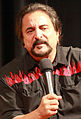 Tom Savini interpreta Burt