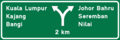 Gantry sign:- Expressway interchange 2 kilometres away