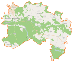 Mapa konturowa gminy Dębnica Kaszubska, blisko centrum na lewo znajduje się punkt z opisem „Krzynia”