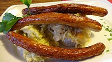 Bratwursts with sauerkraut and mashed potatoes