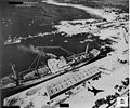 Depart of the missiles, Port Casilda, Cuba, is captured by an RF-101 pilot with the 363rd Tactical Reconnaissance Wing on Nov. 6, 1962, while the aircraft itself casts a shadow over the port.