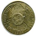 Anverso de moneda de 8 reales (plata) de Carlos IV de 1801 con resello de Seychelles.