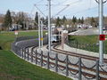 LRT train coming out of Belgravia Road underpass just north of South Campus Station