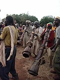 Thumbnail for File:Berta people playing trumpets.jpg