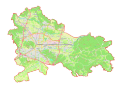 Mapa konturowa gminy miejskiej Lublana, blisko centrum na lewo u góry znajduje się punkt z opisem „Arena Stožice”