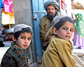 Boys and their father from Qara Bagh District in Ghazni Province