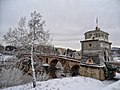 Entrée du pont Milvius enneigée.