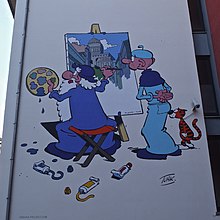 Deux personnages dessinés sur un mur. Celui de gauche représente un paysage urbain en peinture.