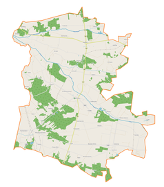 Mapa konturowa gminy Drużbice, blisko centrum na lewo znajduje się punkt z opisem „Teofilów”