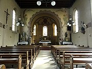 Vue intérieure de la nef vers le chœur de l'église de l'Annonciation.