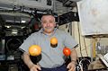 Fyodor Yurchikhin with "fresh" fruits from a recent delivery