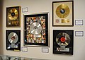 Image 18Platinum records by Elvis Presley, Prince, Madonna, Lynyrd Skynyrd, and Bruce Springsteen, at Julien's Auctions (from Album era)