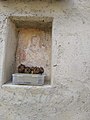 Mount Camiolo di Fondo, fresco on the wall of the Massa del Botér land.