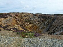 A former mine where the quarry resembles a crater