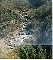 Il torrente Carlone con le anse e cascatelle nell'alta valle in zona Cerreta