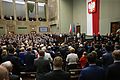 Barwy i godło Polski w sali obrad Sejmu.