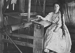 Russian peasant girl near loom.jpg