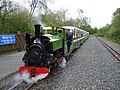 Image 49Ruislip Lido Railway's 12-inch (300 mm) gauge locomotive "Mad Bess" hauling a passenger train.