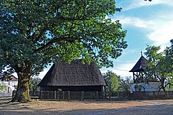 Wooden church and bell tower in Ljutovnica, Serbia