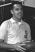 Otto Graham holding a football