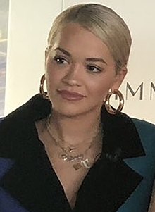 Rita Ora at a press conference in London.jpg