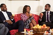 With First Lady Michelle Obama and Dwyane Wade, in the Map Room of the White House (14 January 2014)