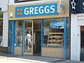 A modern Greggs store front.