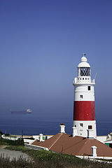 Europa point, seaview with lighthouse and ship passing by