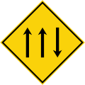 Three-lane carriageway ahead, with one lane in the opposing direction