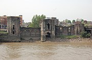 Newport Castle from the east bank. Note the watergate in the centre tower