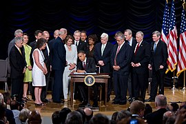 President Obama Signs the Dodd-Frank Wall Street Reform and Consumer Protection Act (4816864266).jpg