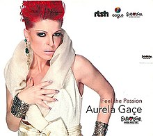 The cover of the single depicting a female posing in front of a white backdrop