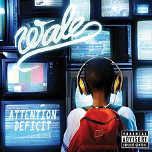 The cover consits of a young boy with a red backpack and yellow headphones looking at a bunch of television screens. The artist's logo appears on the top left corner and the album title is on a TV screen in the bottom left corner.