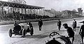 Ralph DePalma and Rupert Jeffkins, pushing the Mercedes down the main straightaway at the conclusion of the 1912 500-Mile Race.