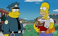 Homer tarjoaa Wiggumille voileipää