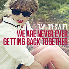 The words "TAYLOR SWIFT WE ARE NEVER EVER GETTING BACK TOGETHER" are put over a skinny young woman with long blonde hair and red lipstick, wearing plastic sunglasses and sitting in a grass field.