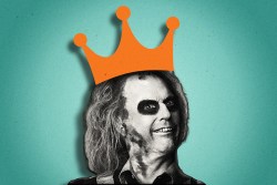 Michael Keaton as Beetlejuice in the film "Beetlejuice Beetlejuice" wearing a crown