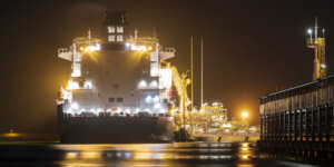 LNG Oil tanker supplying liquefied gas to the Lng terminal