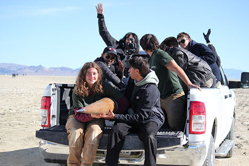 The USCRPL team with the rocket before liftoff