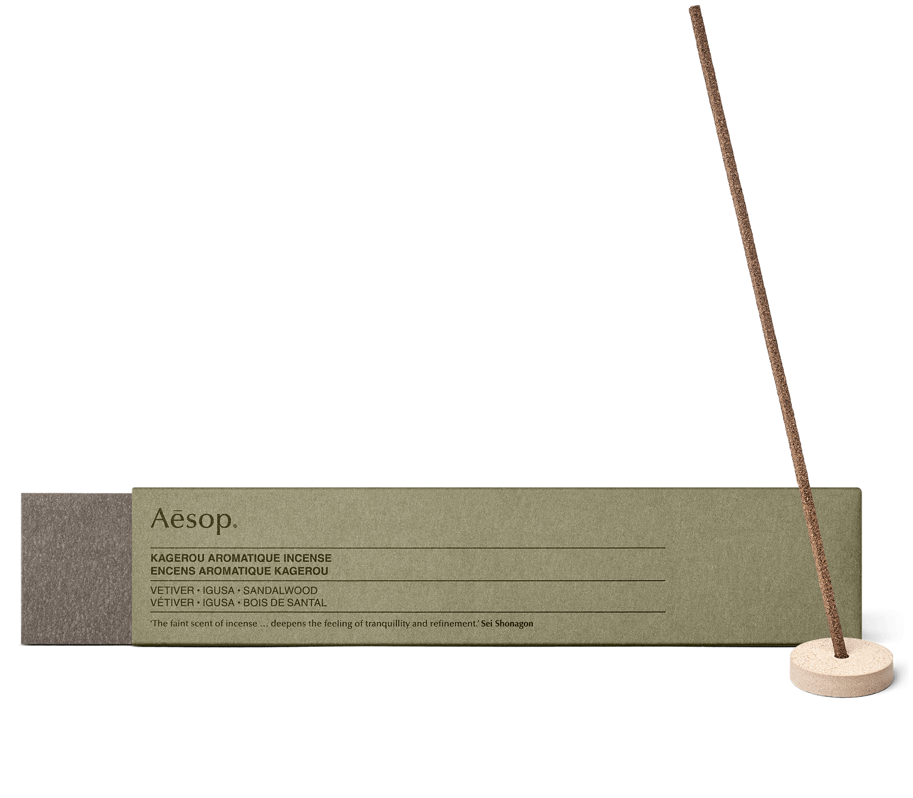 A stick of Kagerou Aromatique Incense in the Kanuma pumice holder, alongside carton packaging. 