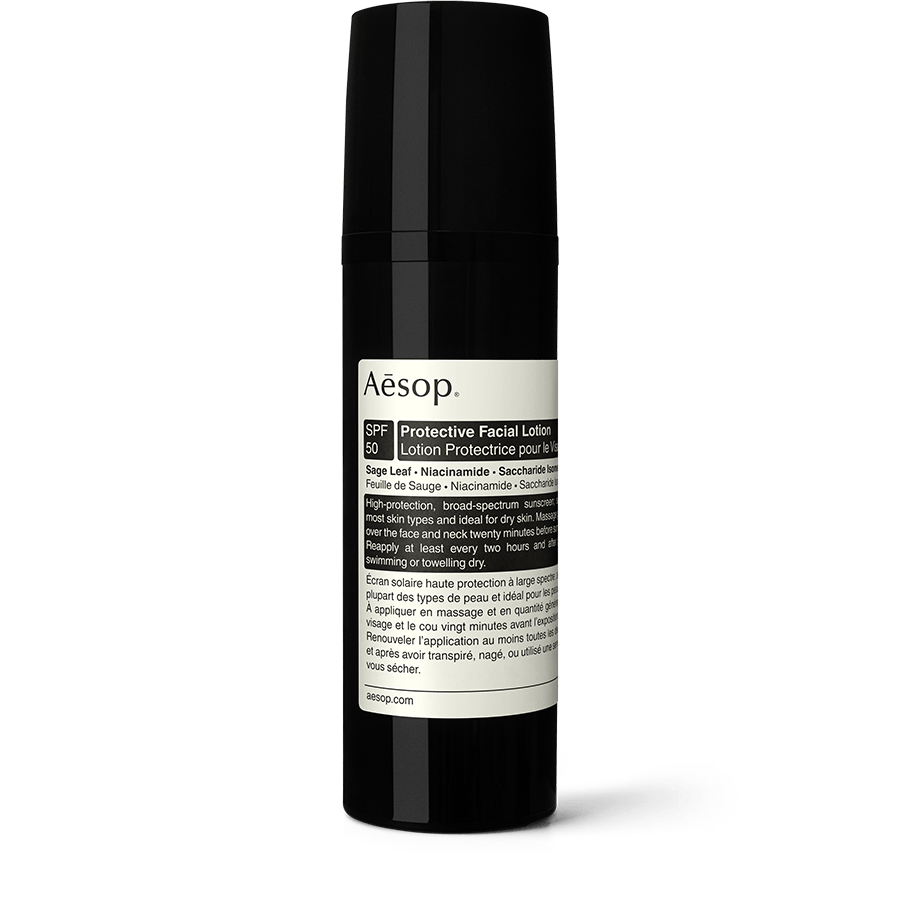 Protective Facial Lotion SPF50 in a black plastic bottle.