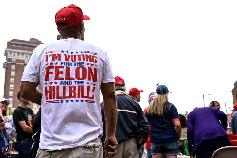 Supporters wait in line for a campaign rally with Republican presidential candidate former President Donald Trump in Asheville, N.C., Wednesday, Aug. 14, 2024. (AP Photo/Matt Kelley)