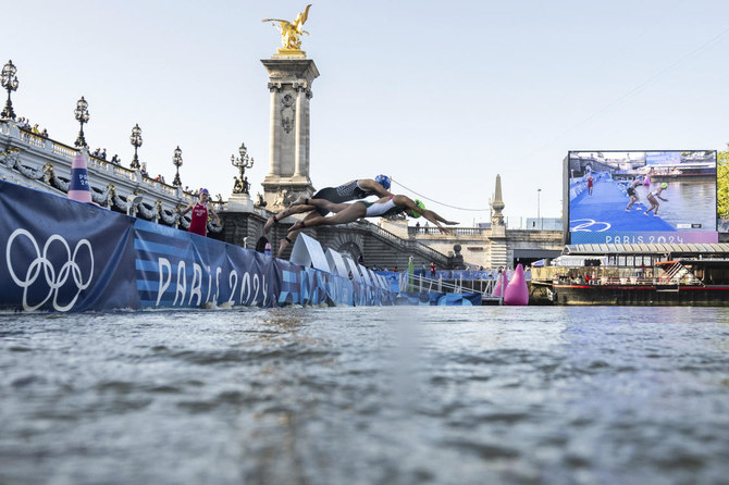 Olympic marathon swim test run is canceled over water quality concerns for Seine River